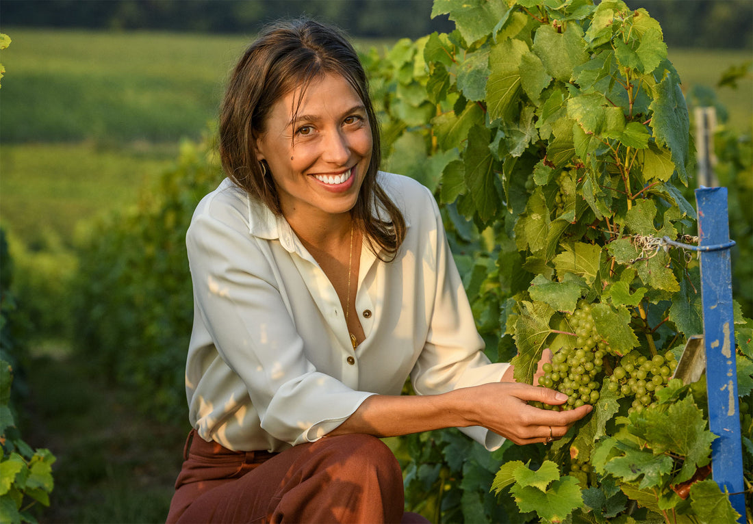 Lucie Pereyre de Nonancourt tending the vines