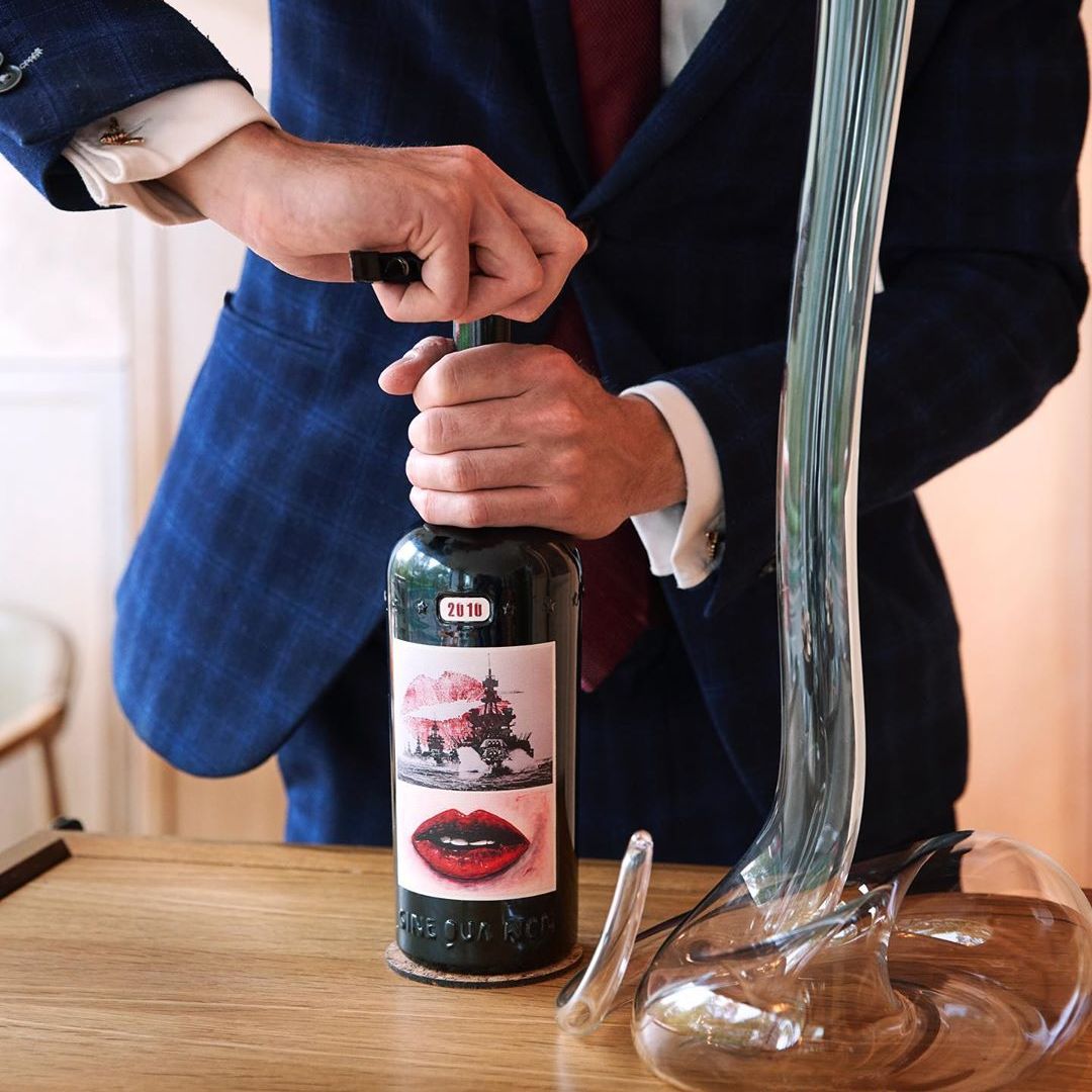 Julien decanting a bottle of Sine Qua Non at HIDE