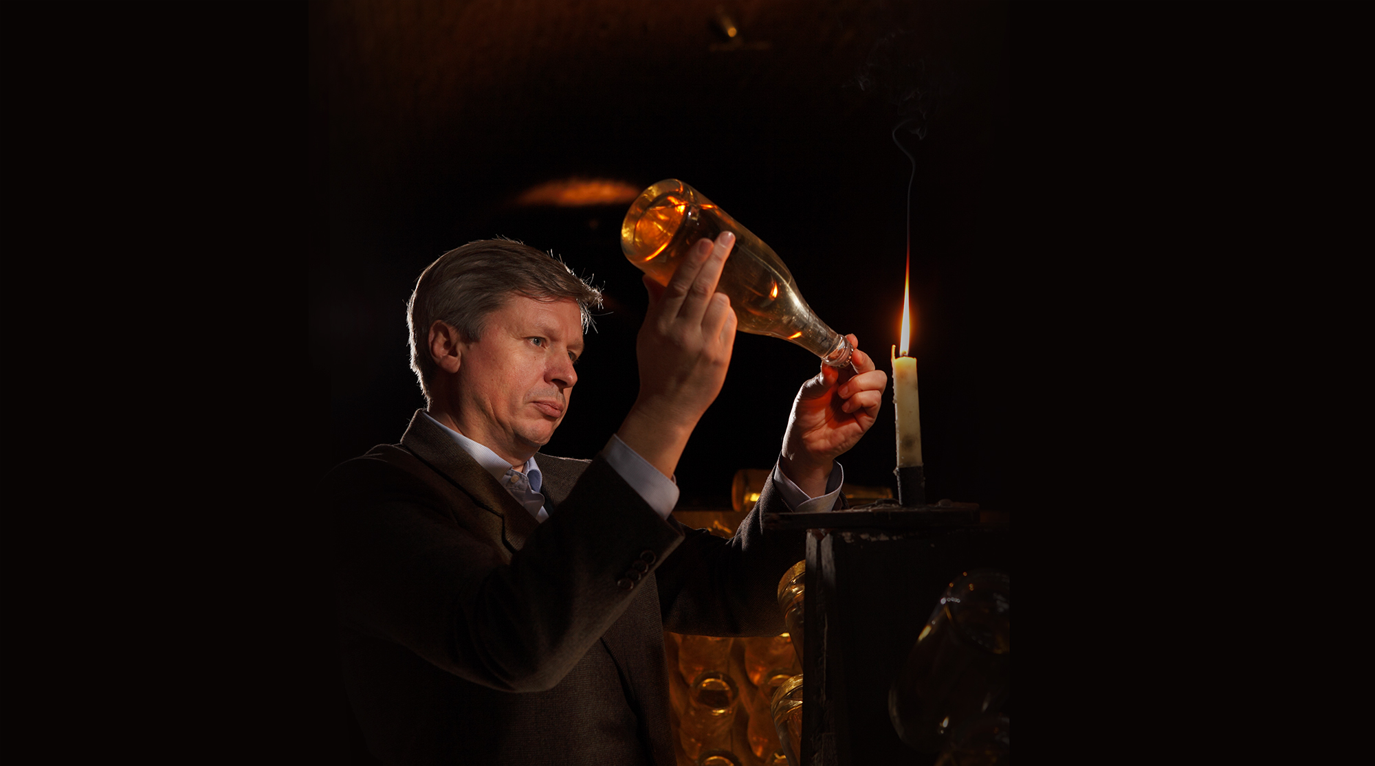 Jean-Baptiste Lecaillon inspects a bottle of Cristal