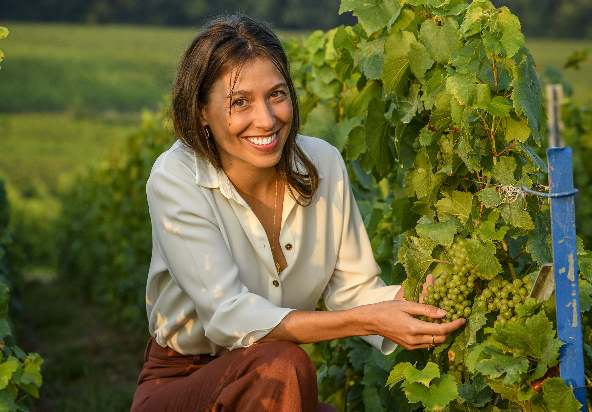 Lucie Pereyre de Nonancourt tending the vines