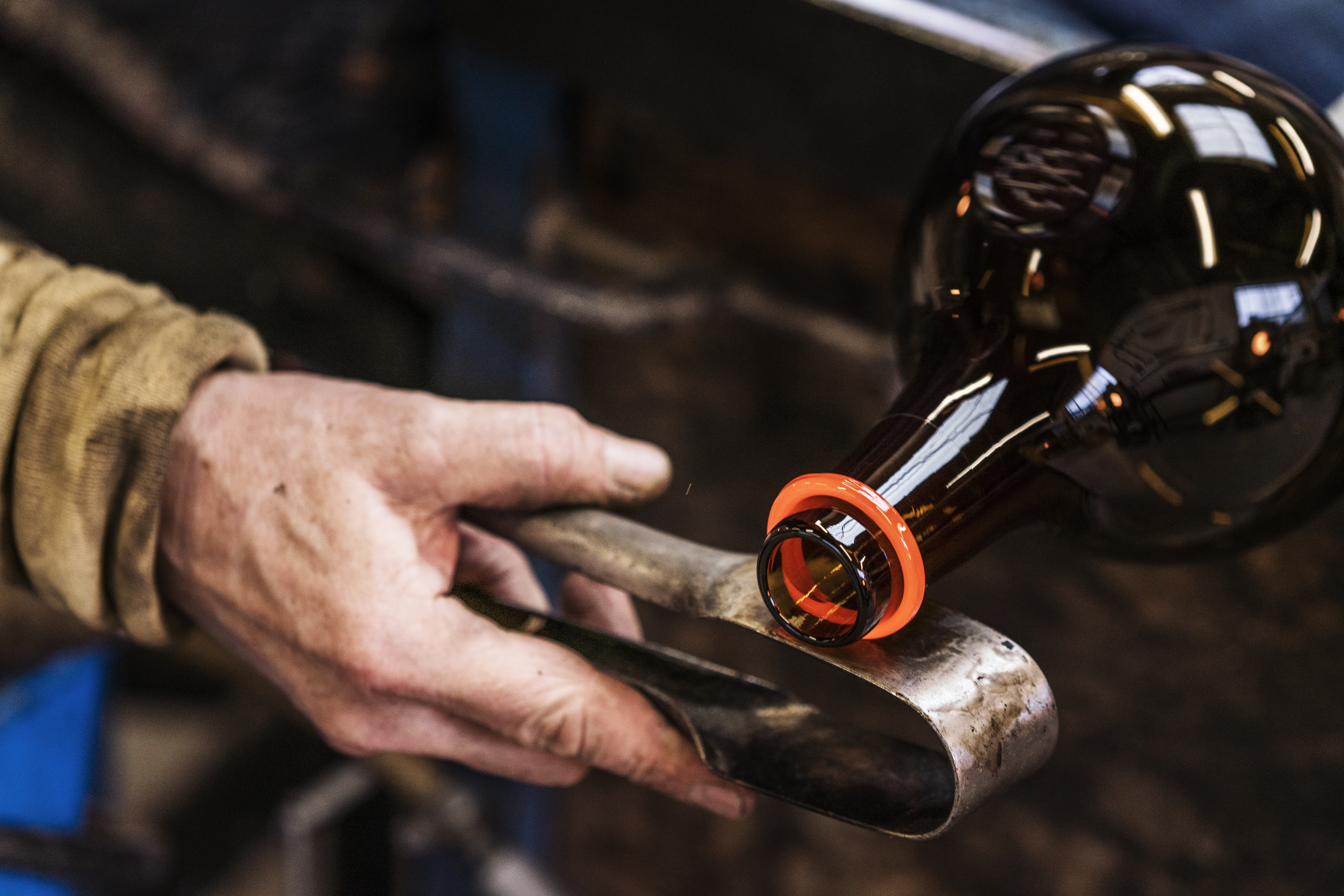 Finishing the rim on the London 1650 bottle design